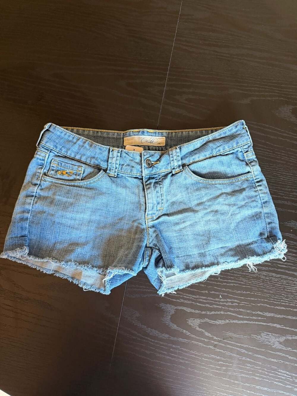 O'Neill Low Rise Cut Off Raw Hem Denim Micro Shorts with Palm Tree Patch - Picture 4 of 8